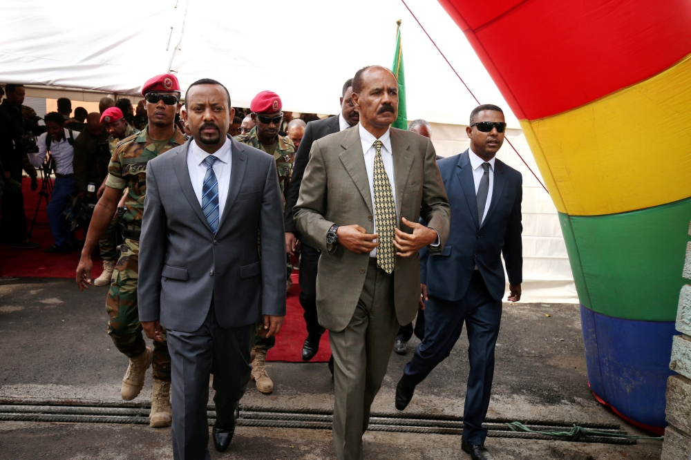 FILE PHOTO: Eritrea's President Isaias Afwerki and Ethiopia's Prime Minister, Abiy Ahmed arrive for an inauguration ceremony marking the reopening of the Eritrean embassy in Addis Ababa, Ethiopia July 16, 2018. REUTERS/Tiksa Negeri/File Photo