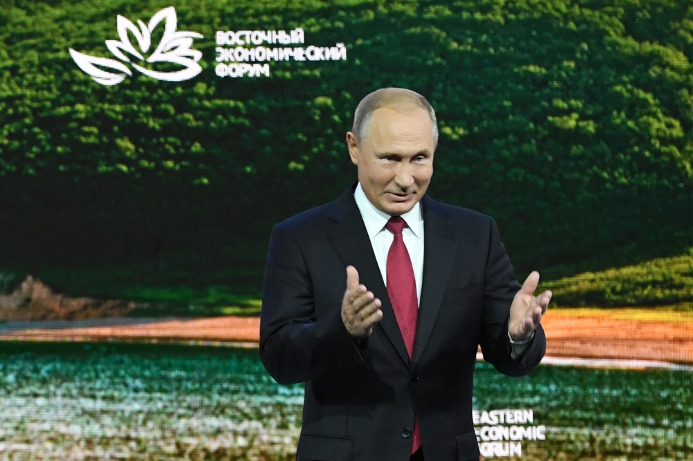 Russian President Vladimir Putin attends the plenary session of the Eastern Economic Forum in Vladivostok on September 12, 2018. / AFP / Kirill KUDRYAVTSEV