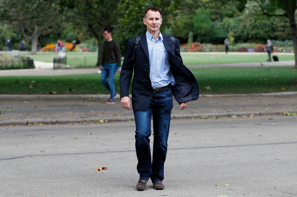 Britain's Foreign Secretary Jeremy Hunt walks towards the Foreign Office in London, September 21, 2018. Reuters/Peter Nicholls
 