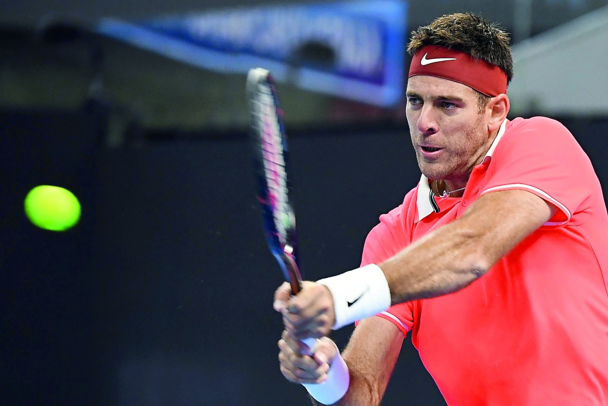 Juan Martin del Potro of Argentina hits a return during his men's singles second round match against Karen Khachanov of Russia at the China Open tennis tournament in Beijing on October 3, 2018. AFP / Greg Baker

