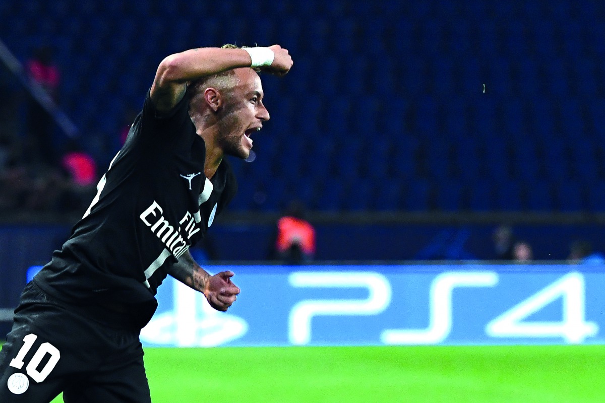 PSG forward Neymar reacts after scoring a goal during their UEFA Champions League match against Red Star Belgrade at the Parc des Princes Stadium in Paris, yesterday.