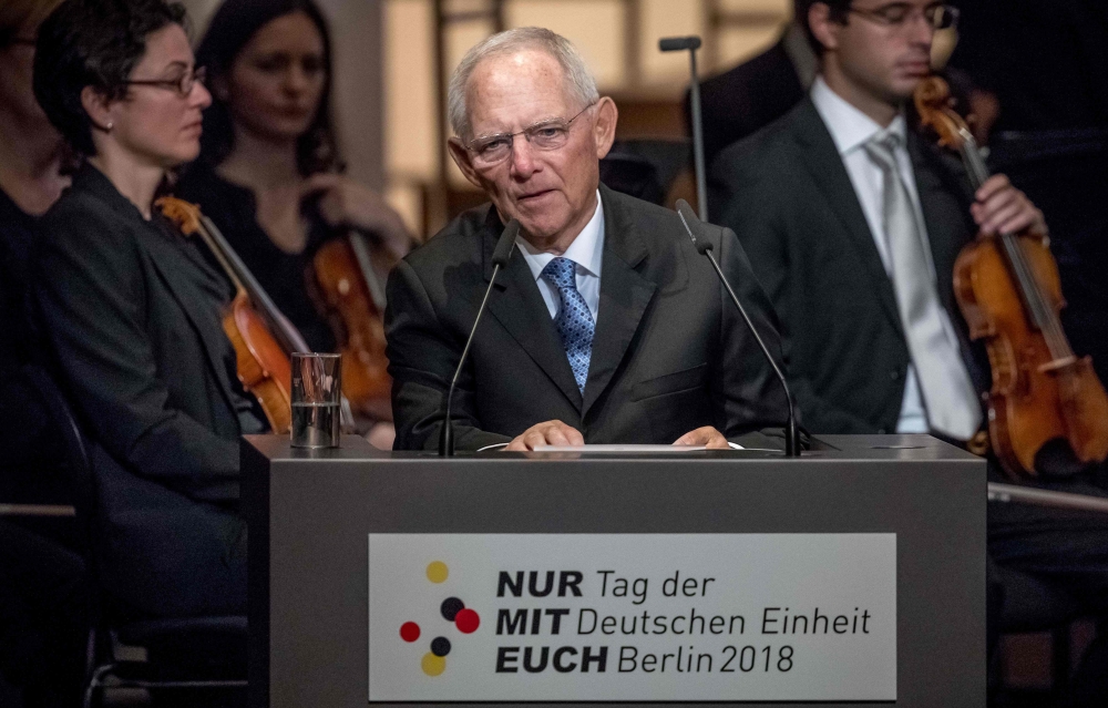 President of the Bundestag (lower house of parliament) Wolfgang Schaeuble delivers his speech at the State opera during the German Unification Day public festival in Berlin, Germany, on October 3, 2018. AFP / POOL / Michael Kappeler