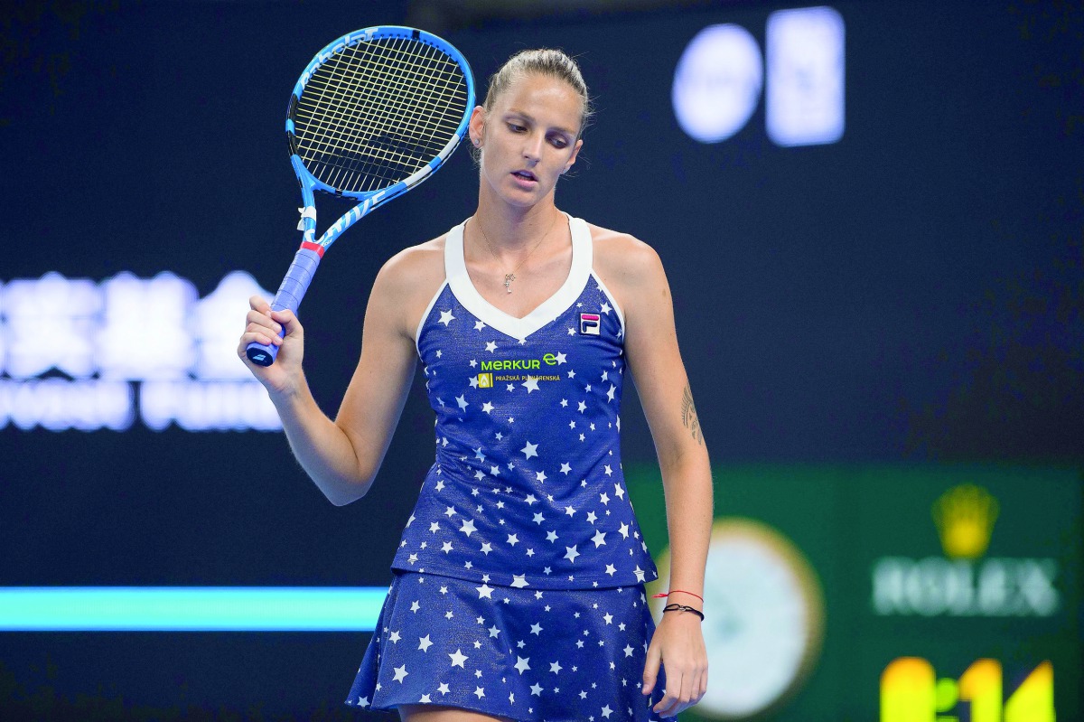 Karolina Pliskova of Czech Republic reacts losing a point during her women's singles third round match against Wang Qiang of China at the China Open tennis tournament in Beijing on October 4, 2018. AFP / Nicolas Asfouri
