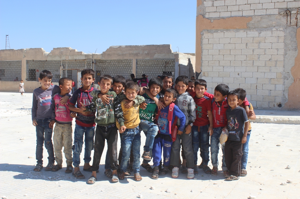 Syrian children are seen at a classroom at the Jisr al-Shughur district of Idlib, Syria on October 6, 2018. Hadi Harrat - Anadolu