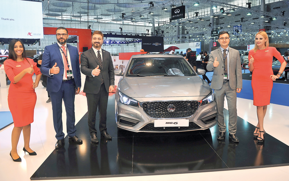 Tamer Abdalla Hassan, Auto Class Cars Brand Manager, and other officials at the launch of MG6 2019 during the opening of Qatar Motor Show 2018 yesterday. 