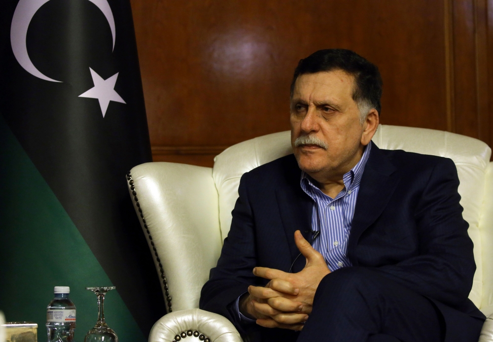 Libya's unity government Prime Minister Fayez al-Sarraj speaks during an interview with AFP in the capital Tripoli on November 8, 2018. / AFP / Mahmud TURKIA 