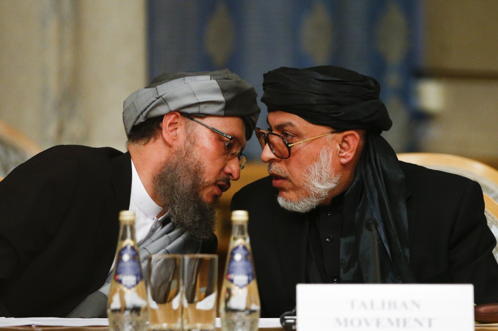 Head of Political Office of the Taliban Sher Mohammad Abbas Stanakzai (R) attends the second round of the Moscow format consultations on Afghanistan at the President Hotel in Moscow, Russia on November 09, 2018. (Sefa Karacan/Anadolu Agency)