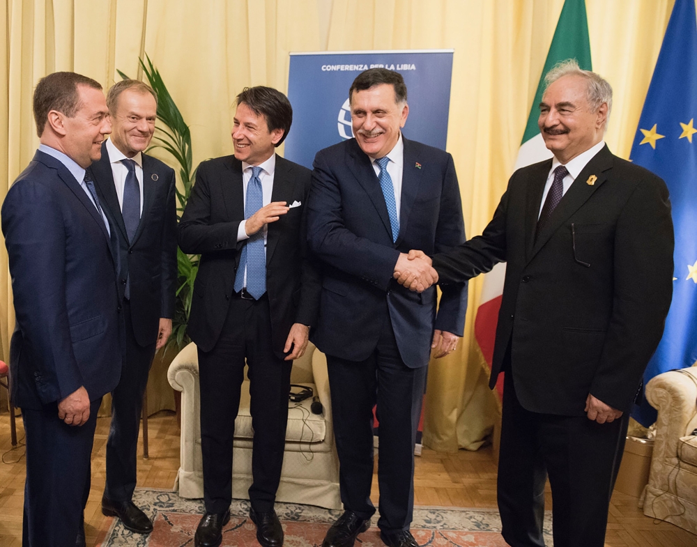 Italian Prime Minister Giuseppe Conte (C), head of the UN-backed unity government in Tripoli, Prime Minister Fayez al-Sarraj (2ndR), self-proclaimed Libyan National Army (LNA) Chief of Staff, Khalifa Haftar (R), EU President Donald Tusk (2ndL) and Russian