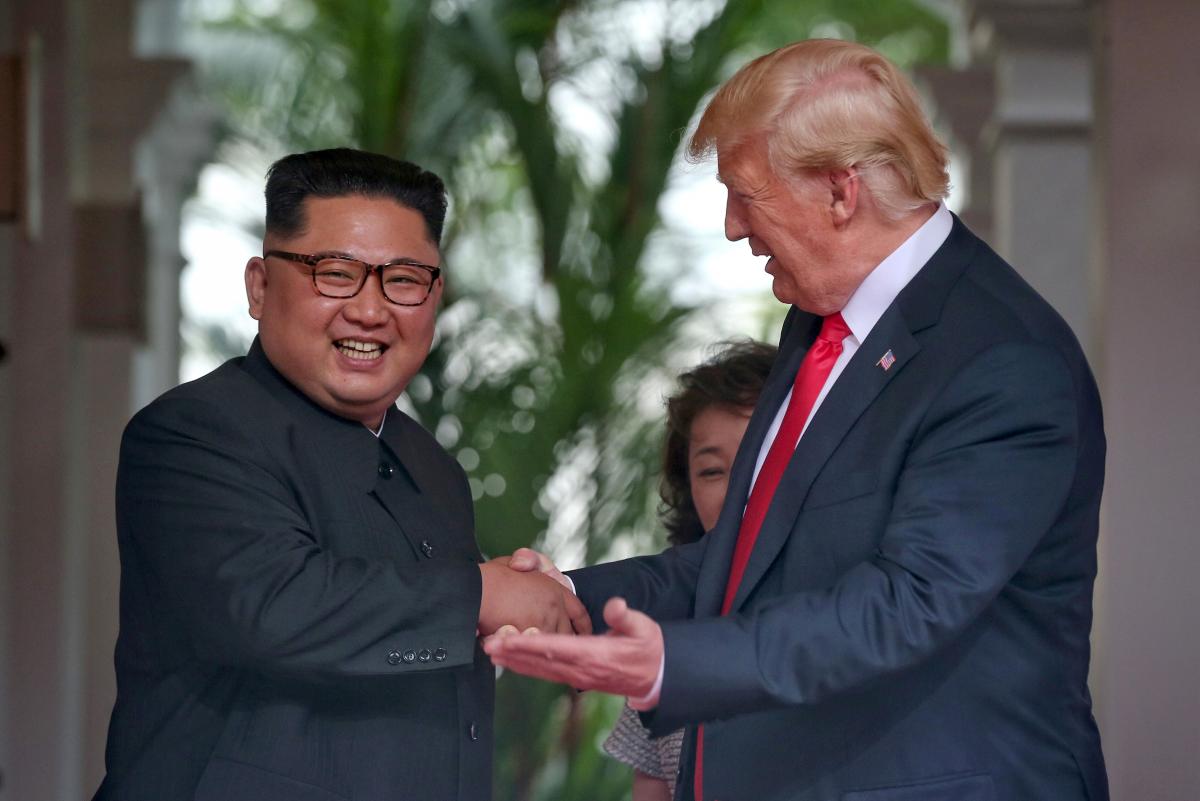 US President Donald Trump meets North Korean leader Kim Jong Un at the Capella Hotel on Sentosa island in Singapore, June 12, 2018. (Kevin Lim/The Straits Times via Reuters) 