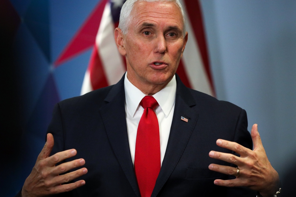 US Vice President Mike Pence speaks during a news conference in Singapore, November 15, 2018. REUTERS/Athit Perawongmetha
