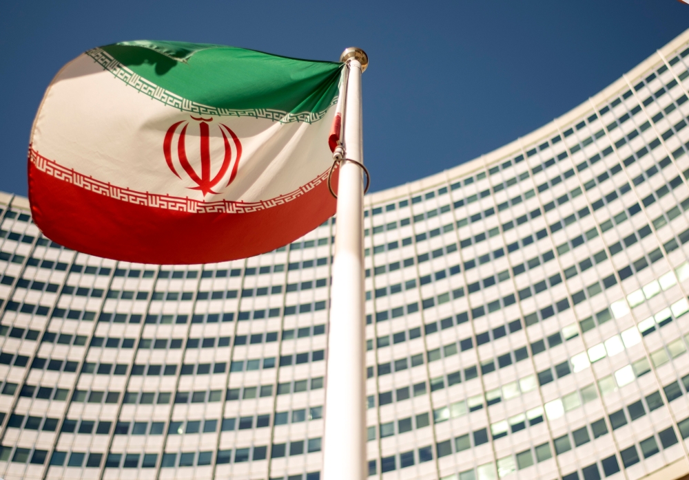 In this file photo taken on September 10, 2018 an Iranian flag flutters outside of the UN headquarters in Vienna, Austria.  AFP / Joe Klamar  