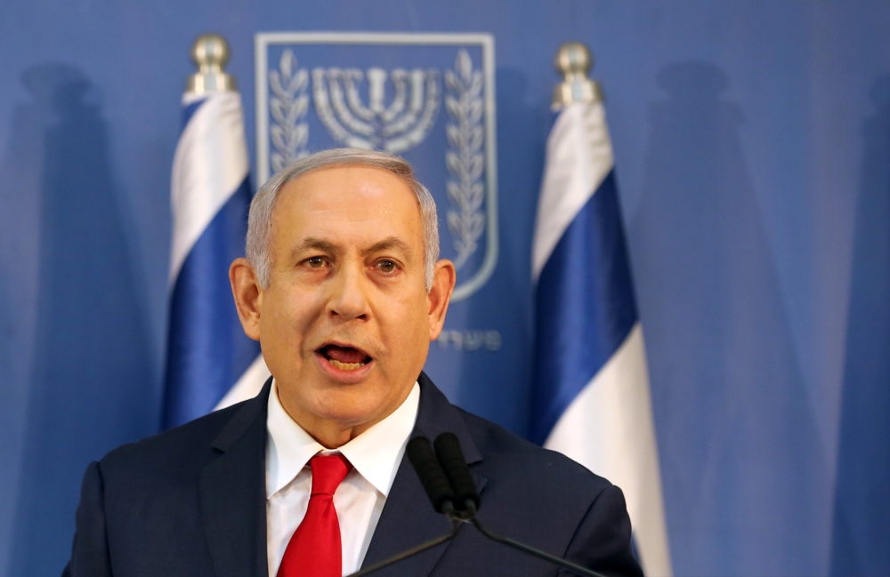 Prime Minister Benjamin Netanyahu delivers a statement to the members of the media in Tel Aviv, Israel November 18, 2018. Reuters/Corinna Kern 
