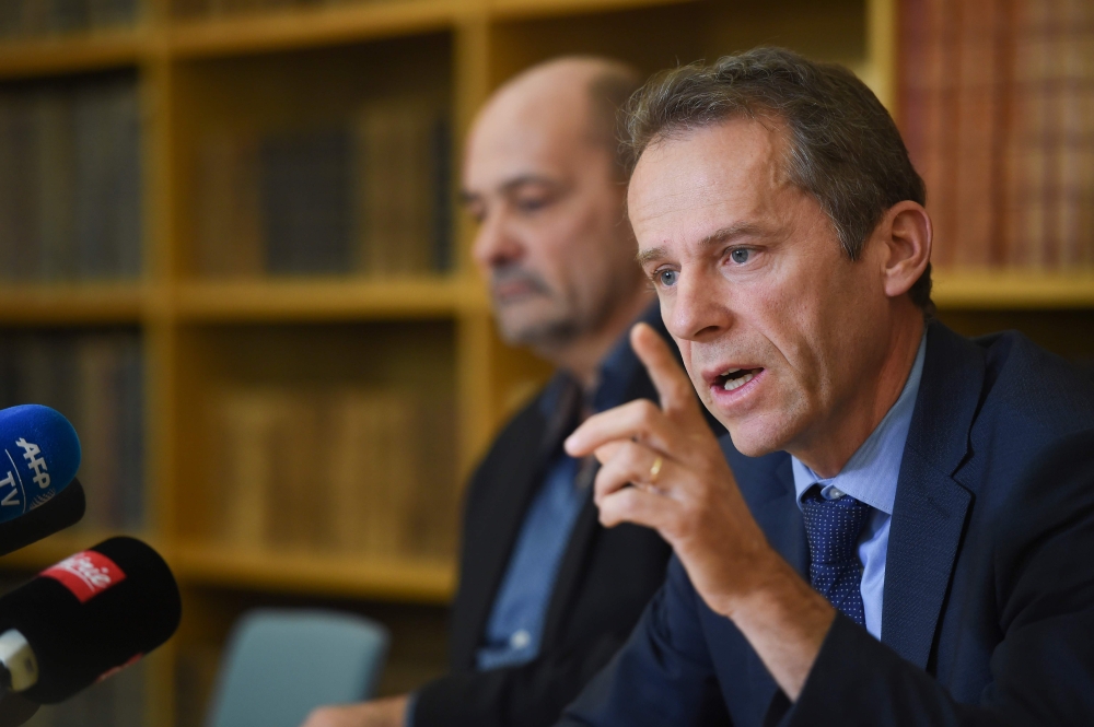 Public prosecutor of Besancon Etienne Manteaux (R), and French gendarme, commanding officer Regis Millet give a presse conference at Besancon's courthouse on November 19, 2018, regarding the disappearance in 2016 of Japanese student, Narumi Kurosaki. / AF