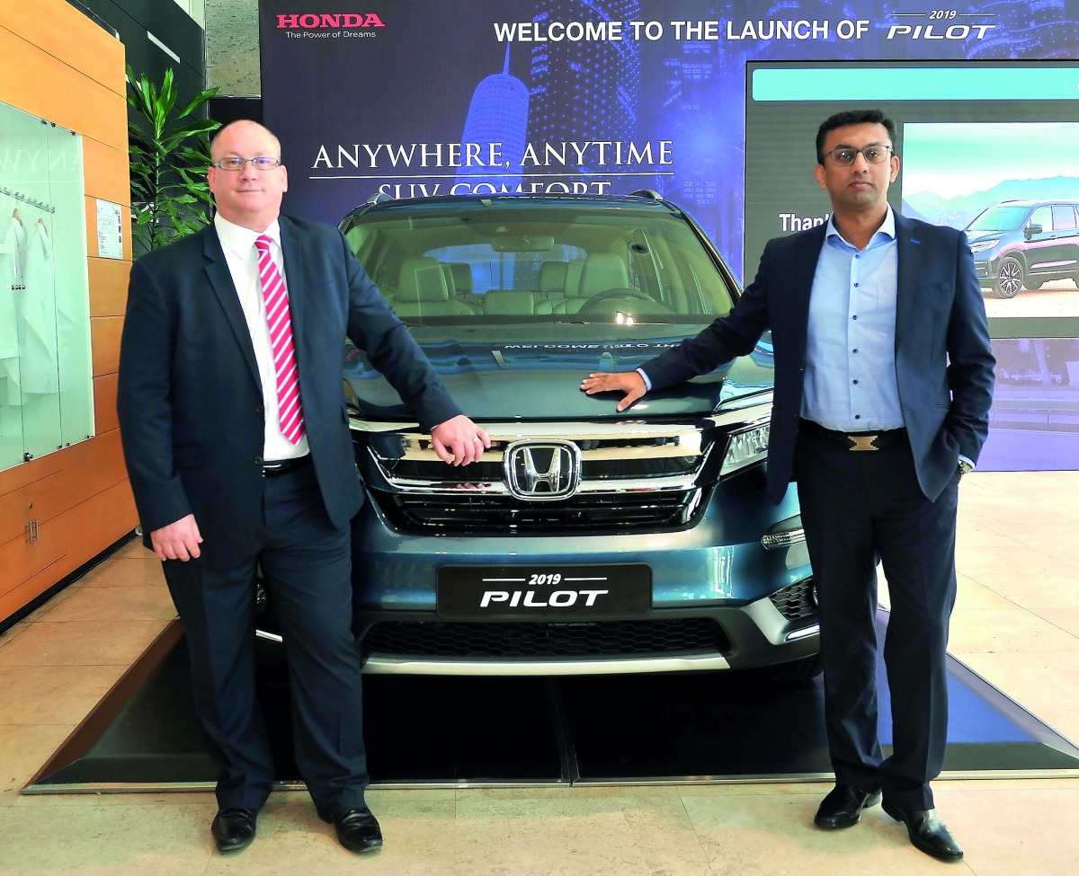 Faisal Sharif (right), Managing Director, Domasco; with Greig Roffey, Head of Sales and Marketing at Domasco, during the launch of the 2019 Honda Pilot SUV held at the Domasco’s premises in Doha yesterday. Pic: Salim Matramkot / The Peninsula
