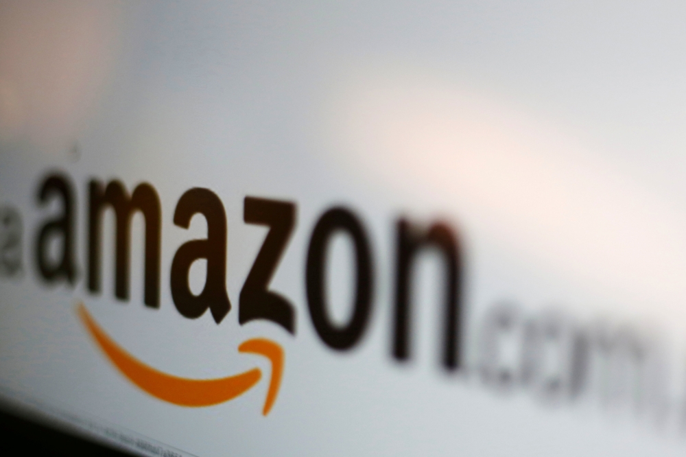FILE PHOTO - The Amazon logo is pictured in this June 8, 2017 illustration photo. REUTERS/Carlos Jasso/Illustration/File Photo