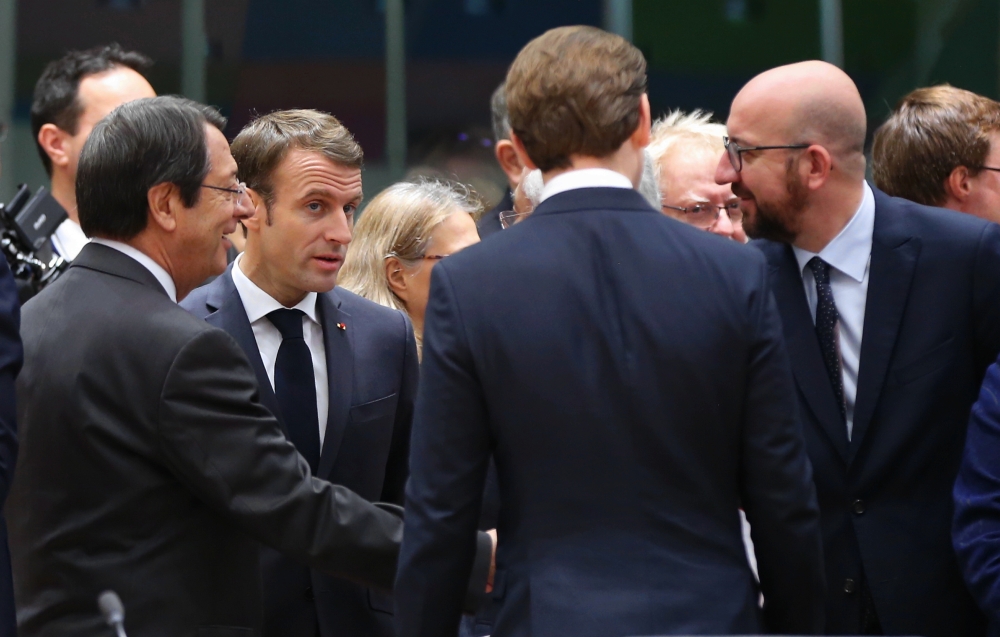 French President Emmanuel Macron (C) and Greek Cypriot Leader Nikos Anastasiadis (L) attend the European Union (EU) Leader Summit on Brexit in Brussels, Belgium on November 25, 2018. (Dursun Aydemir/Anadolu Agency)
 