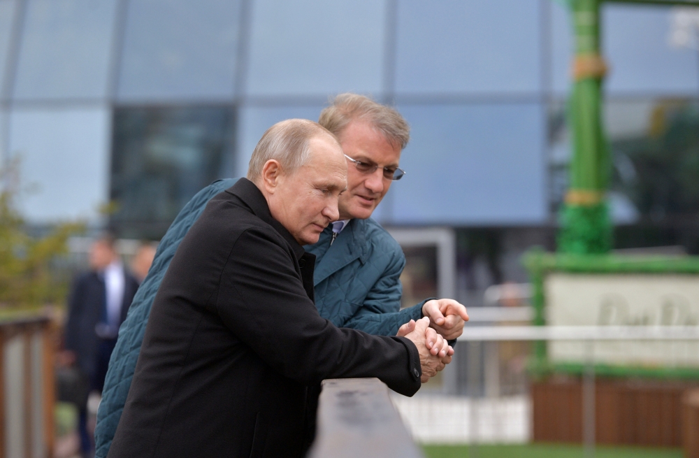Russian President Vladimir Putin accompanied by Chief Executive of Sberbank German Gref while visiting Mria hotel in Yalta, Crimea November 23, 2018. 
