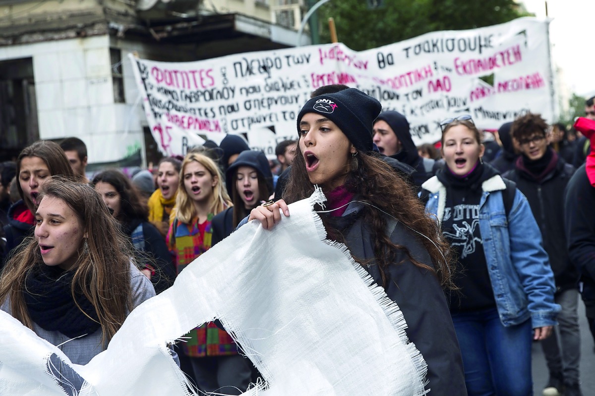 Students stage a protest against racism and fascism in Athens, Greece on November 29, 2018.  (Ayhan Mehmet/Anadolu Agency) 
