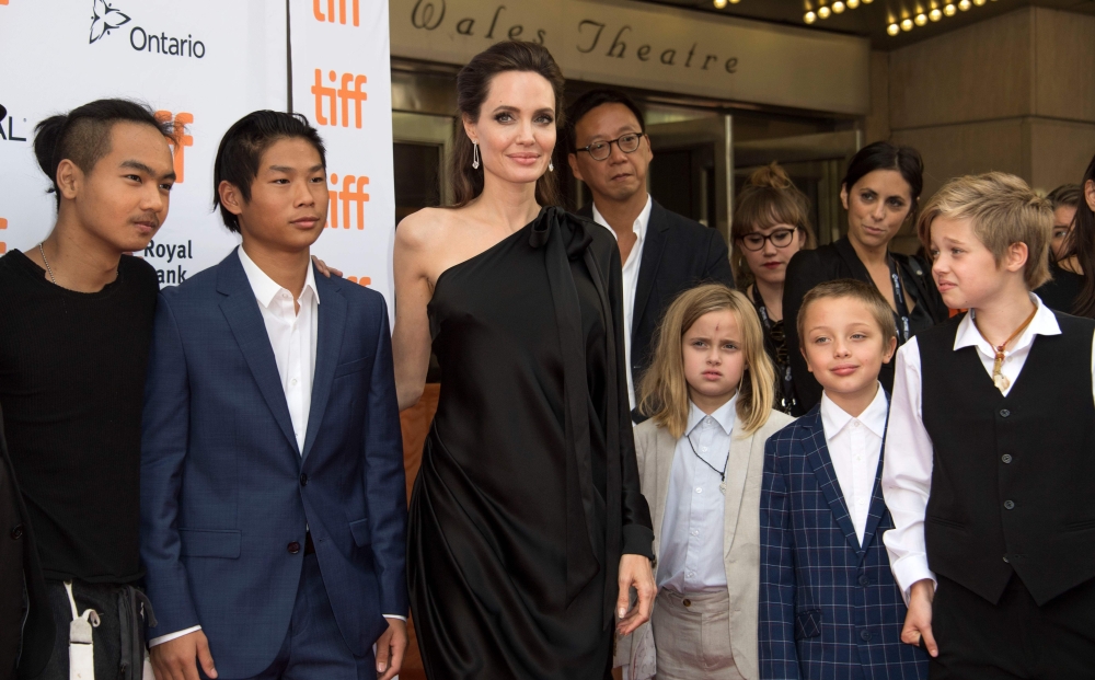 (FILES) In this file photo taken on September 11, 2017 (L-R) Maddox Chivan Jolie-Pitt, Pax Thien Jolie-Pitt, Angelina Jolie, Vivienne Marcheline Jolie-Pitt, Knox Leon Jolie-Pitt and Shiloh Nouvel Jolie-Pitt attend the premiere of 'First they Killed my Fat