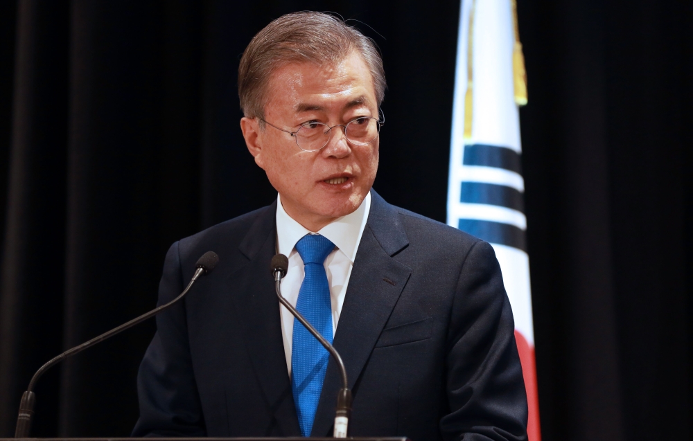 South Korea's President Moon Jae-in attends a joint press conference in Auckland with New Zealand Prime Minister Jacinda Adern (not pictured) on December 4, 2018. / AFP / Diego Opatowsk 