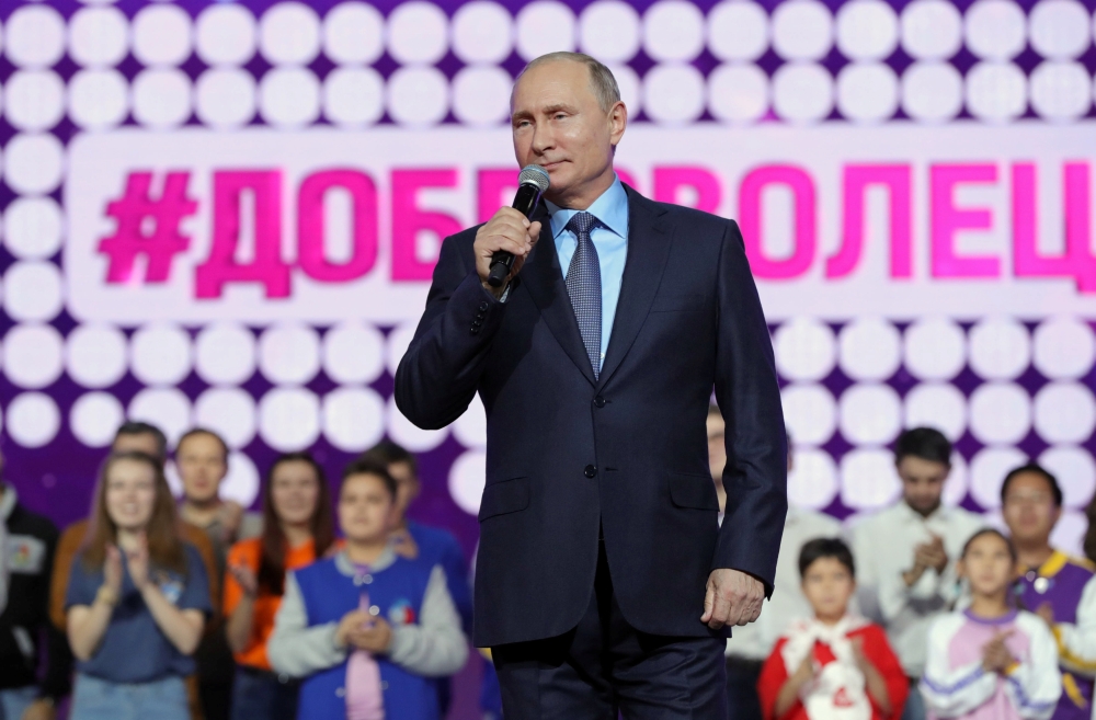 Russia's President Vladimir Putin delivers a speech at the International Volunteer Forum in Moscow, Russia December 5, 2018. Sputnik/Mikhail Klimentyev/Kremlin