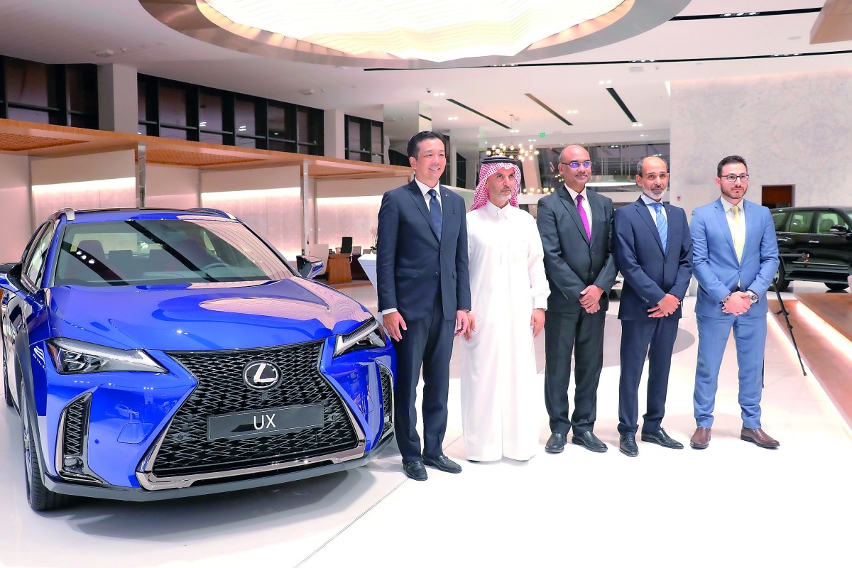Officials pose for a group picture at the launch ceremony of the all-new Lexus UX in the Middle East.