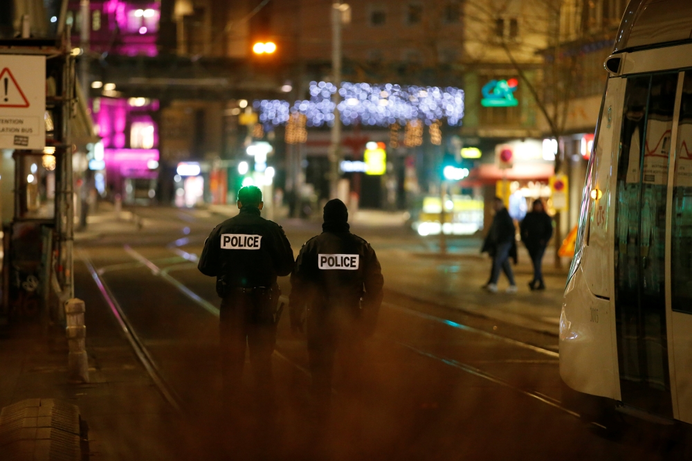 Police secure a street and the surrounding area after a shooting in Strasbourg, France, December 11, 2018. Reuters/Vincent Kessler
 