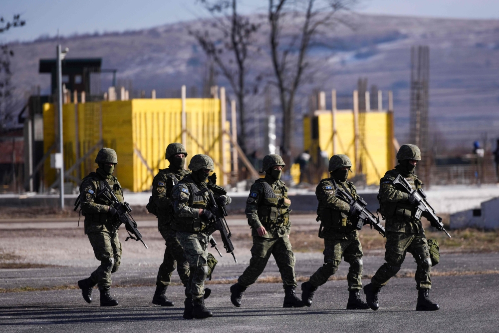 Members of the Kosovo Security Force (KSF) take part in a drill at the 