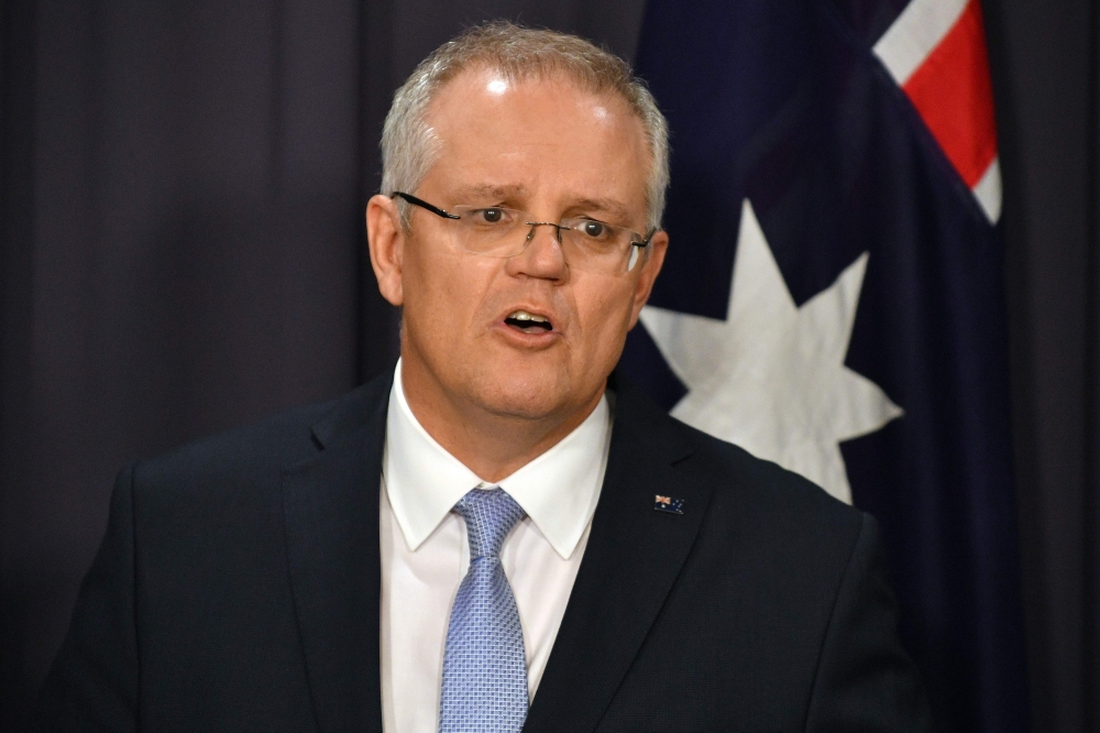 (FILES) In this file photo taken on August 24, 2018 Australia's incoming Prime Minister Scott Morrison speaks at a press conference in Canberra. AFP / SAEED KHAN
