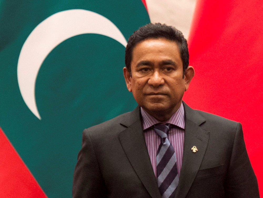FILE PHOTO: Maldives President Abdulla Yameen attends a signing meeting at the Great Hall of the People in Beijing, China December 7, 2017. Fred Dufour/Pool via REUTERS