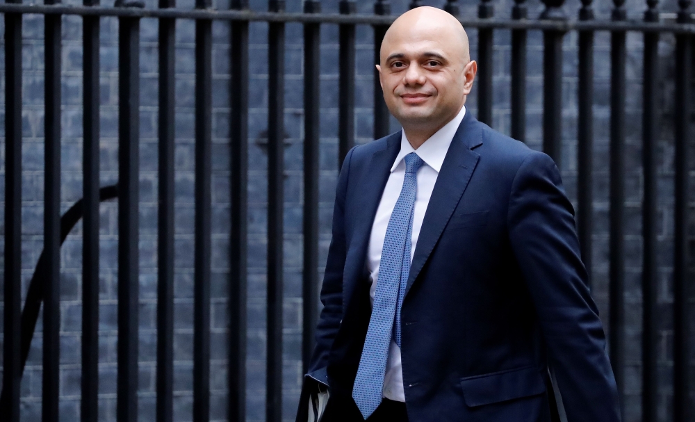 Britain's Home Secretary Sajid Javid arrives to attend the weekly meeting of the Cabinet at 10 Downing Street in central London on December 18, 2018. AFP / Tolga AKMEN
