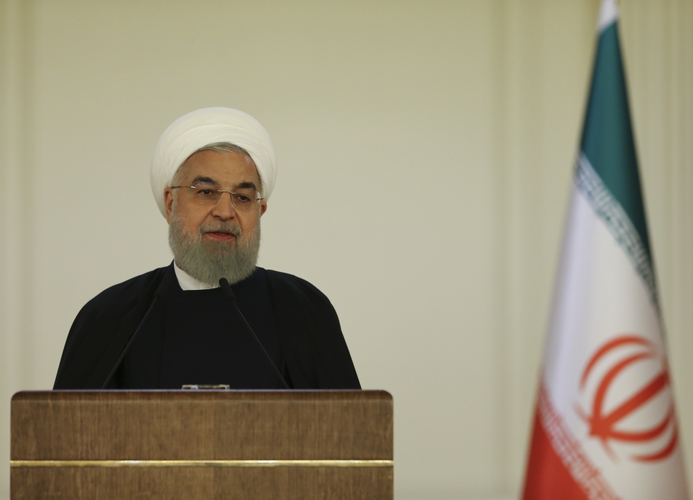President of Iran, Hassan Rouhani delivers a speech during Turkey-Iran Business Forum at Cankaya Palace in Ankara, Turkey on December 20, 2018. ( Erçin Top - Anadolu Agency )