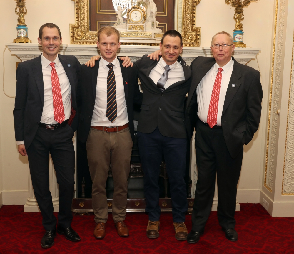 (FILES) In this file photo taken on October 16, 2018 British divers involved in the Tham Luang cave rescue in Thailand, (L-R) Chris Jewell, Connor Roe, Jim Warny and Rob Harper, pose for a photograph at a reception hosted by Britain's Prince William, Duke