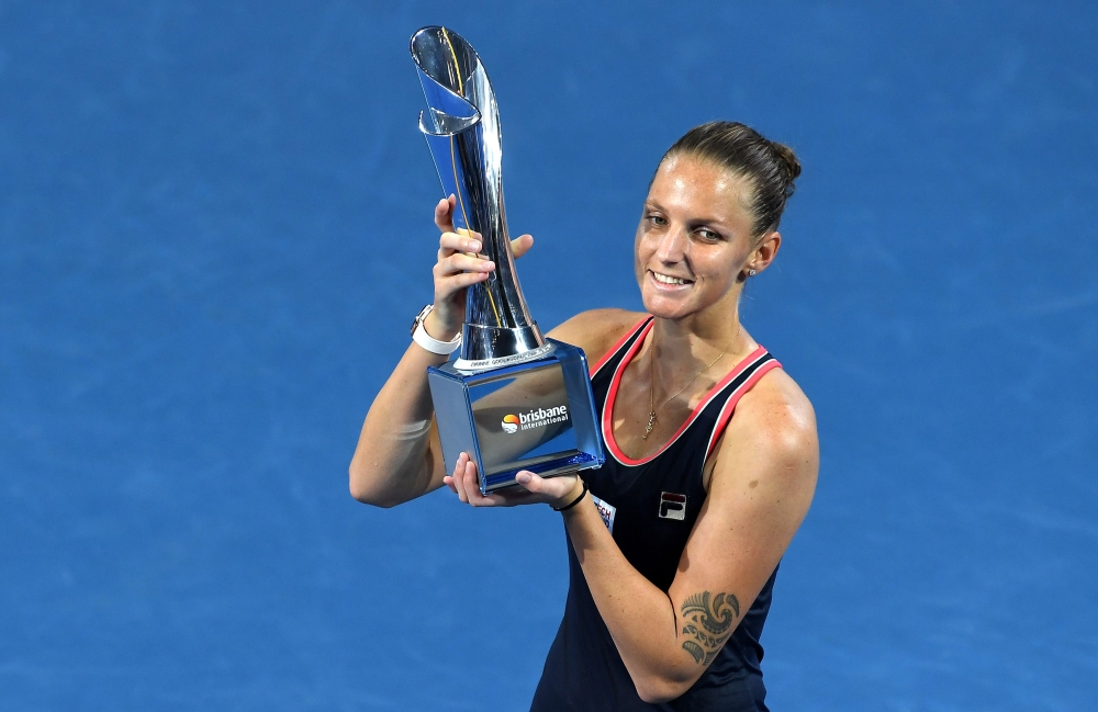 The Czech Republic's Karolina Pliskova poses with the winner's trophy following her victory over Lesia Tsurenko of Ukraine in their women's singles final match at the Brisbane International tennis tournament in Brisbane on January 6, 2019. AFP / Saeed Kha