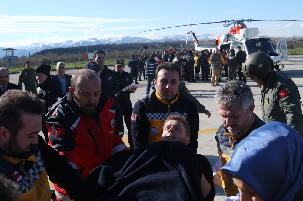One of the crew rescued from sunken ship is being taken to hospital on January 07, 2019 in Samsun, Turkey. Veysel Altun - Anadolu 
