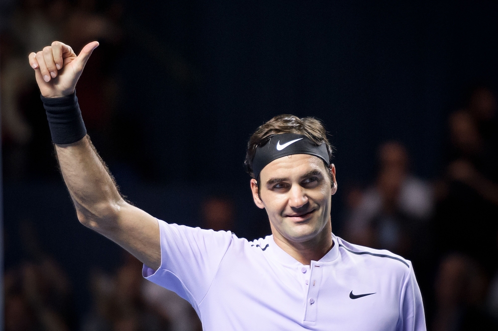 (FILES) In this file photo taken on October 28, 2017, Switzerland's Roger Federer celebrates his victory against Belgium's David Goffin in their semi-final match at the Swiss Indoors ATP 500 tennis tournament in Basel. AFP / Fabrice Coffrini 