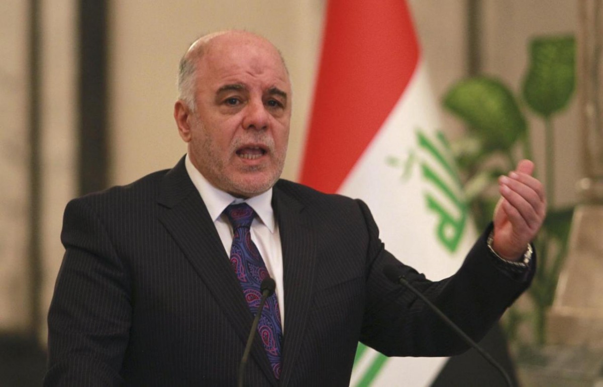 Iraq's Prime Minister-designate Haider al-Abadi gestures during a news conference in Baghdad August 25, 2014. REUTERS/Mahmoud Raouf Mahmoud