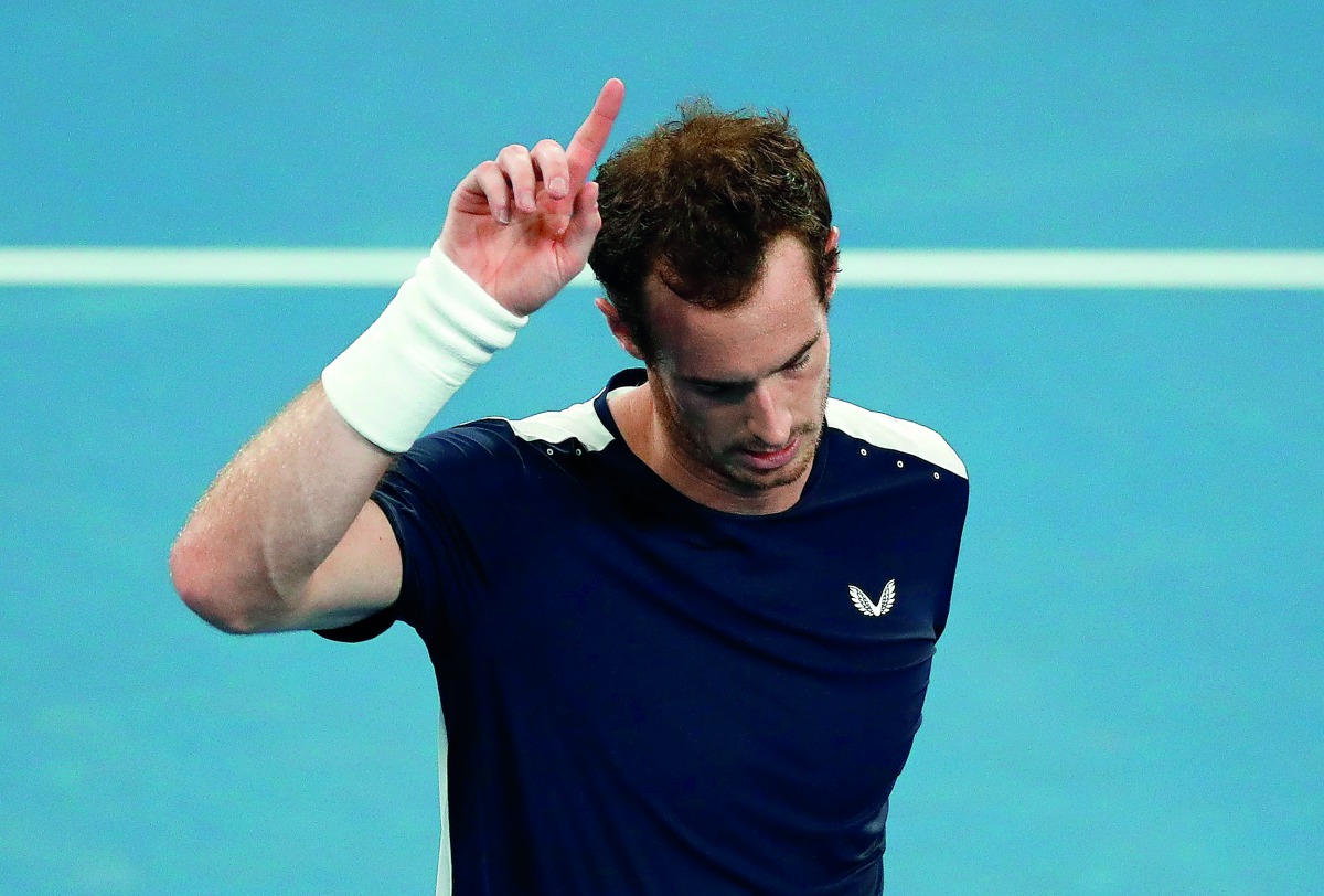 Britain's Andy Murray looks dejected after losing the match against Spain's Roberto Bautista Agut. Reuters/Edgar Su