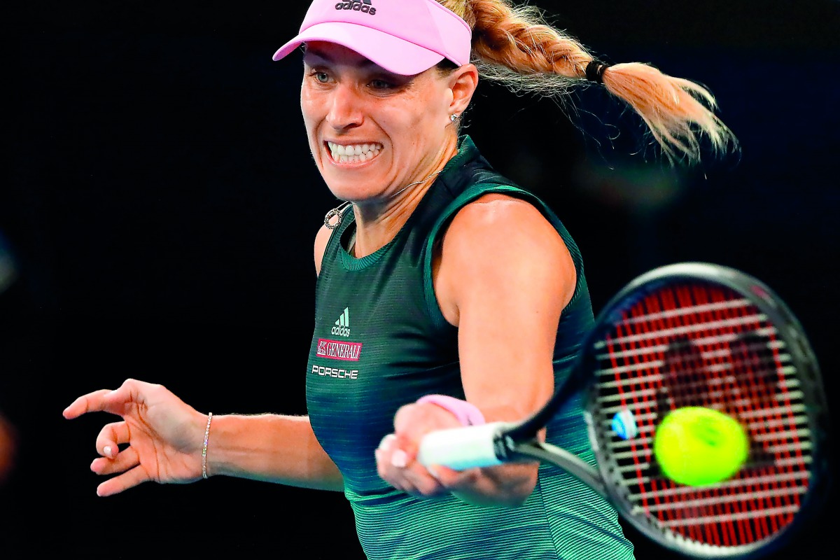 Germany’s Angelique Kerber hits a return against Brazil’s Beatriz Haddad Maia.