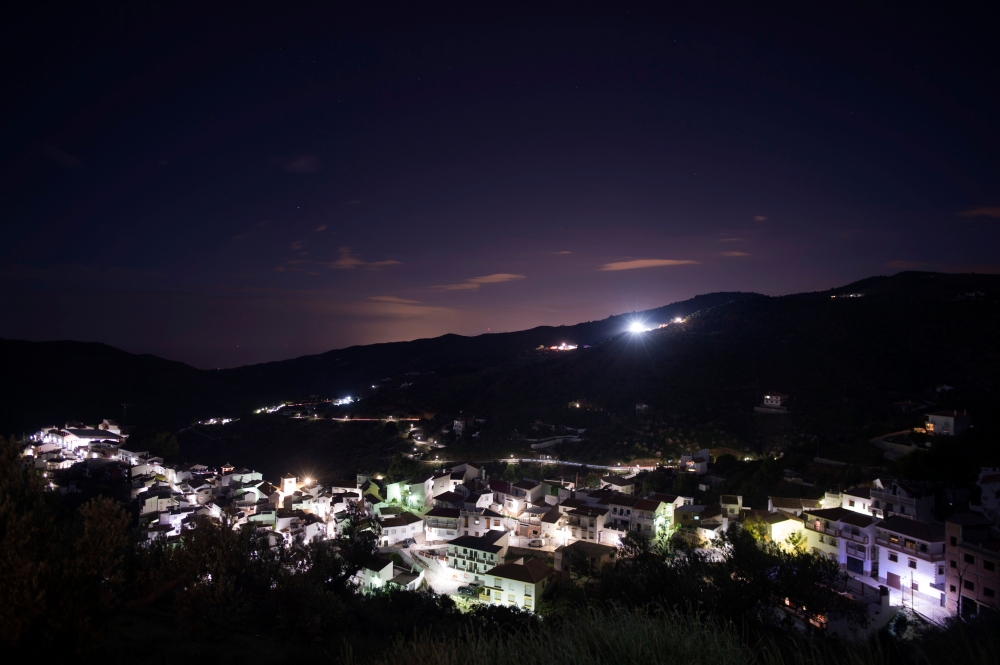 Picture shows a general view of the village of Totalan on January 17, 2019, where rescue workers continue their efforts to find a boy who fell down a well.  AFP / Jorge Guerrero 