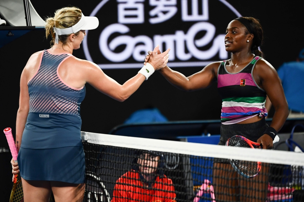 Russia's Anastasia Pavlyuchenkova (L) shakes hands with Sloane Stephens of the US after winning their women's singles match on day seven of the Australian Open tennis tournament in Melbourne early on January 21, 2019. (AFP / Jewel SAMAD)