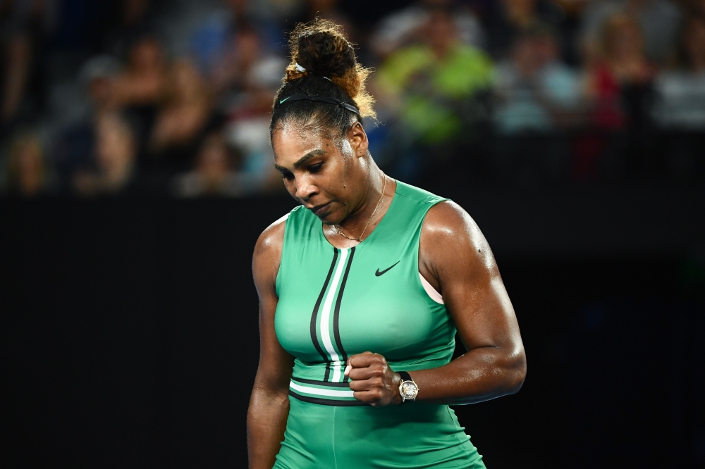 Serena Williams of the US reacts after a point against Romania's Simona Halep during their women's singles match on day eight of the Australian Open tennis tournament in Melbourne on January 21, 2019. AFP / Jewel Samad 