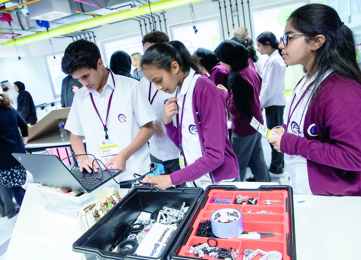 The students from different schools in Qatar display prototypes of their engineering design projects to guests at the opening ceremony,