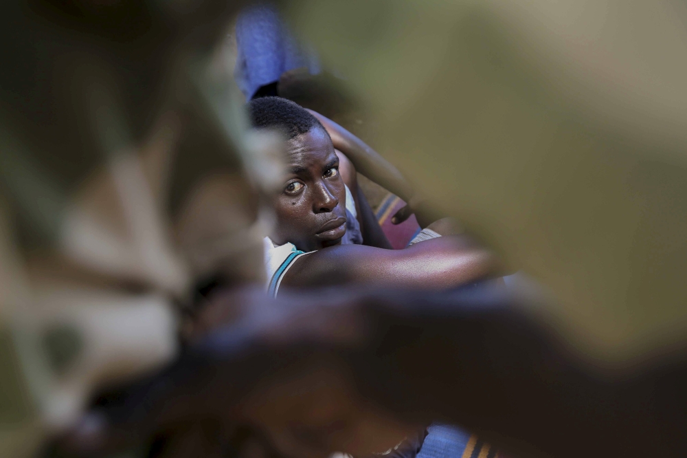 A former ex-Seleka child soldier waits to be released in Bambari, Central African Republic, May 14, 2015. Reuters/Emmanuel Braun/File Photo
 