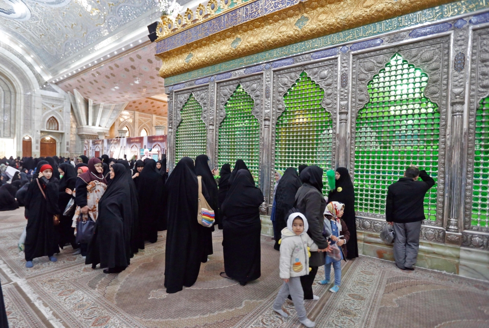 Pilgrims visit the tomb of Iran's late founder of the Islamic Republic, Ayatollah Ruhollah Khomeini, on the occasion of 40th anniversary of Khomeini's return from exile from Paris at his mausoleum in southern Tehran on February 01, 2019.  AFP 