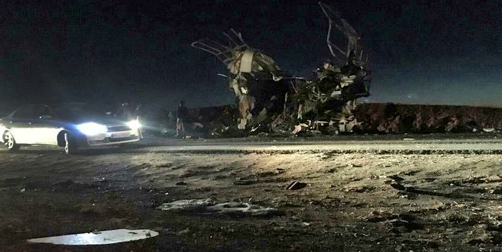 TOPSHOT - A handout picture released by the Iranian news agency Fars News on February 13, 2019, shows a bus that was reportedly blown up by a suicide attack in southeastern Iran on February 13, 2019. / AFP / fars news / Handout 