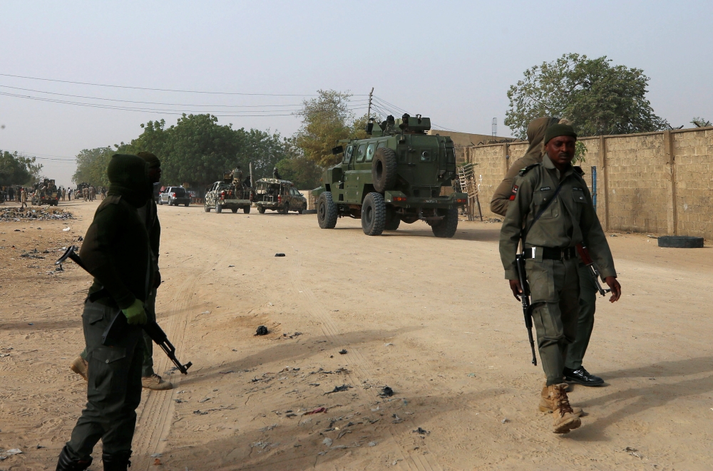 Nigerian military secure the area where a man was killed by suspected militants during an attack around Polo area of Maiduguri, Nigeria February 16, 2019. REUTERS/Afolabi Sotunde