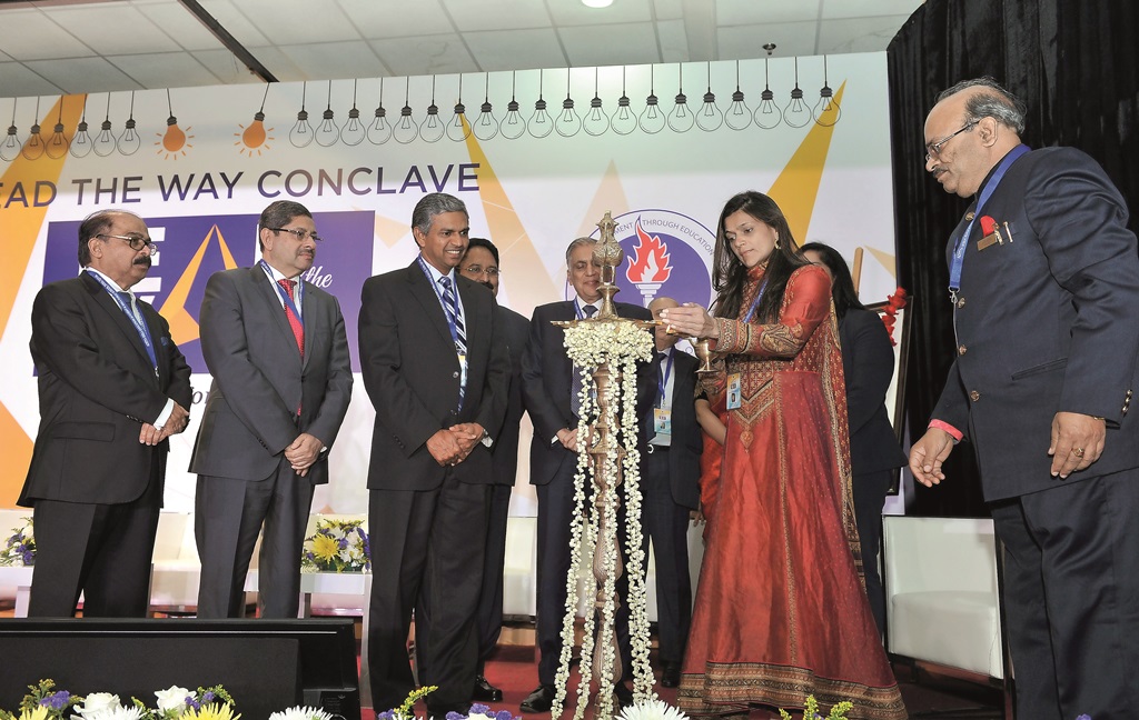 Neerja Birla (second right), Founder and Chairperson, Aditya Birla Education Trust; lighting a traditional lamp at the opening of a Educational Conclave organised by the Birla Public School, Doha (BPS), at the school premises on Thursday. P Kumaran (third