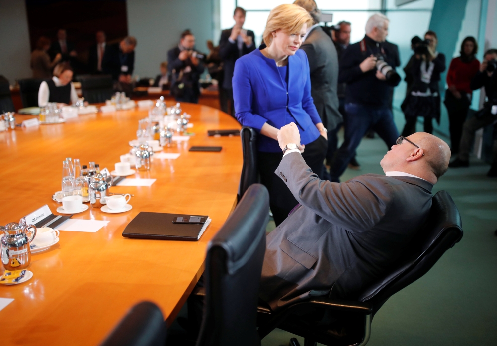 German Economic Minister Peter Altmaier and German Agriculture Minister Julia Kloeckner arrive for the weekly cabinet meeting at the Chancellery in Berlin, Germany, February 13, 2019. REUTERS/Hannibal Hanschke