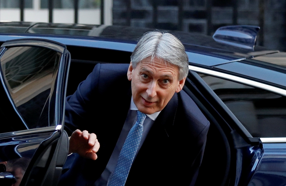 Britain's Chancellor of the Exchequer Philip Hammond is seen outside of Downing Street in London, Britain, February 19, 2019. REUTERS/Peter Nicholls